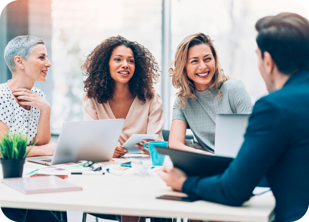 Professionals sharing ideas around a meeting table